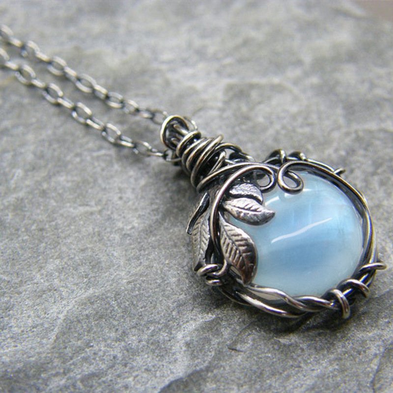 Cross-border popular bohemian style leaf wrapped pendant necklace for women retro imitation moonstone glass jewelry