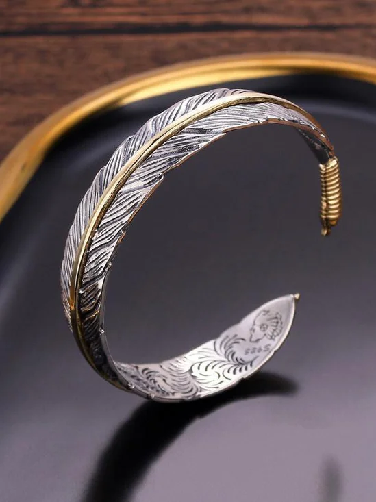 Feather bracelet with adjustable opening