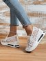 Floral Embroidered Mesh Paneled Slip-On Wedge Sneakers