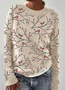 A bird standing on a tree branch, vintage embroidered round neck sweater