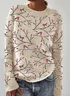 A bird standing on a tree branch, vintage embroidered round neck sweater